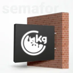 Podświetlane logo z grafiką przypominającą owoc i napisem 'kg', umieszczone na czarnym panelu, zamontowane na ceglanej ścianie. W tle widoczny napis 'semafor'.
