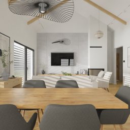 DP STUDIO Alina Wróbel - Nowoczesny salon z jadalnią: drewniany stół i szare krzesła, w tle otwarta przestrzeń z wysokim sufitem, belkami i designerską lampą. TV na betonowej ścianie, kominek, duże okna z pasmami światła.
