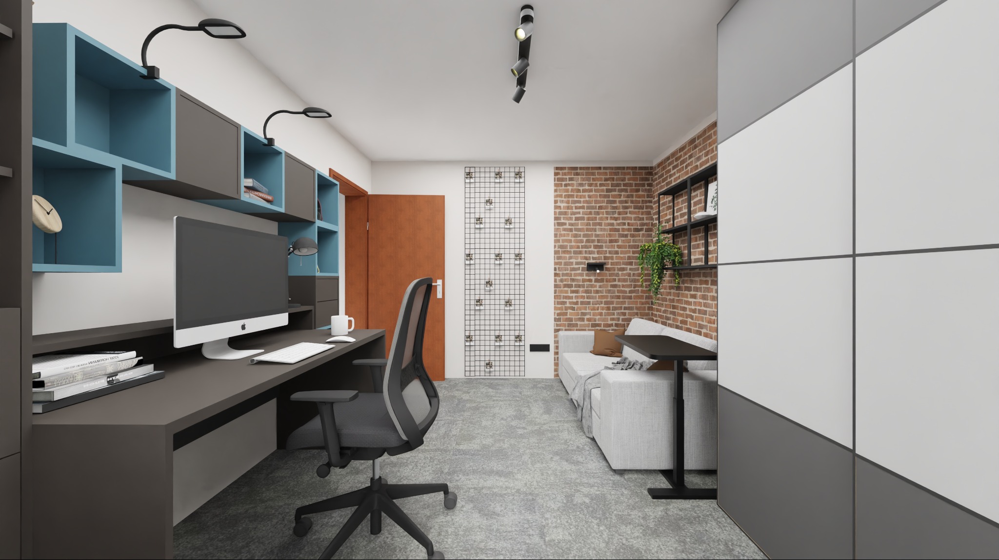 Nowoczesne, wielofunkcyjne wnętrze z biurkiem, komputerem iMac i ergonomicznym fotelem. Akcentowa ściana z cegły, szara sofa i szafa z białymi panelami. Niebiesko-szare półki ścienne.