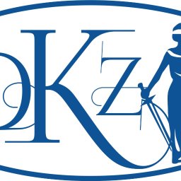 Kancelaria Radcy Prawnego Dorota Kurek -Zielińska - Logo kancelarii prawnej DKZ, przedstawiające stylizowane litery 'DKZ' obok sylwetki Temidy z wagą i mieczem, wszystko w niebieskim kolorze na białym tle, otoczone owalną ramką.