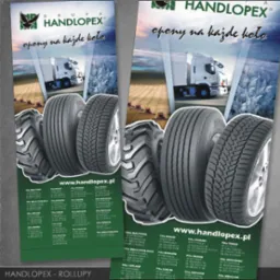 Dwa roll-upy firmy Handlopex z grafiką opon na tle krajobrazu rolniczego i ciężarówki, z adresem strony internetowej i danymi kontaktowymi.