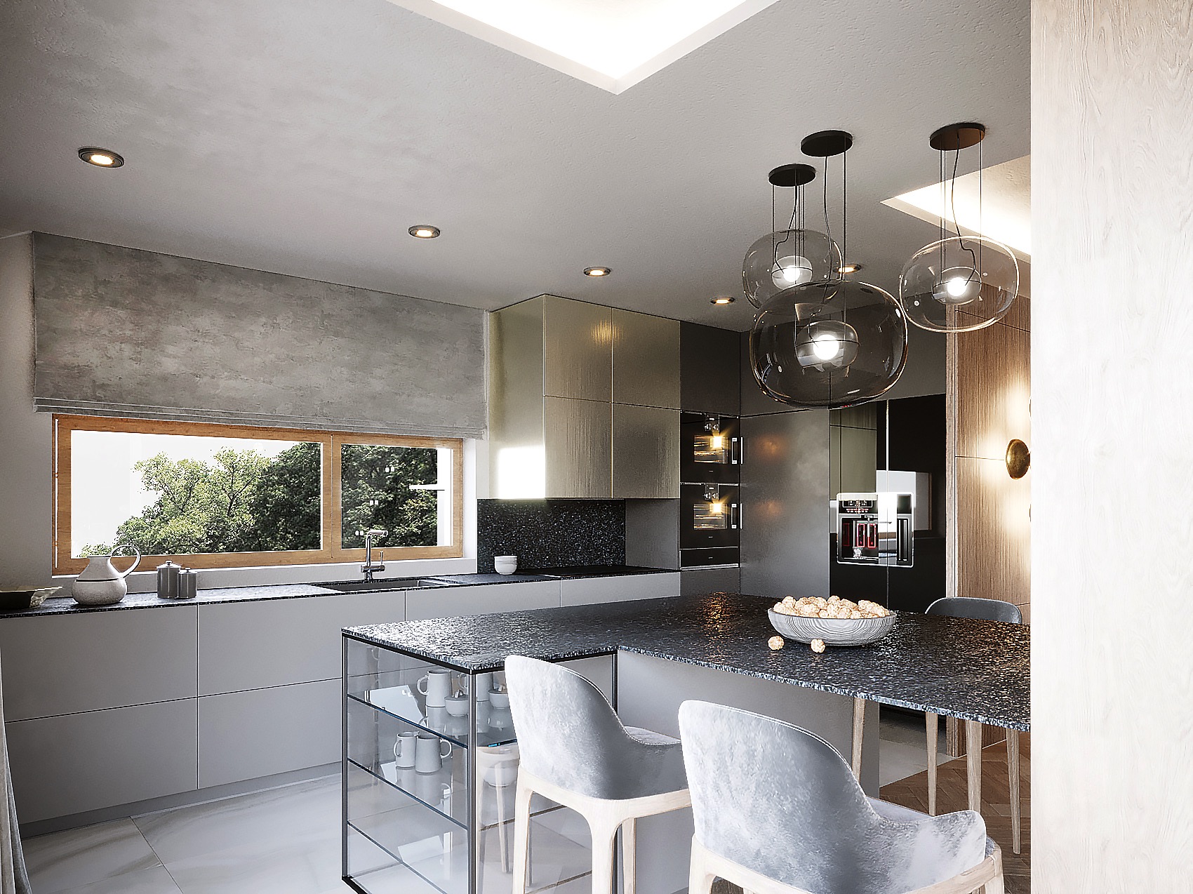 Nowoczesna kuchnia z wyspą, szarymi frontami szafek i blatem z ciemnego kamienia. Nad wyspą wiszą trzy szklane lampy. W tle okno z widokiem na drzewa.