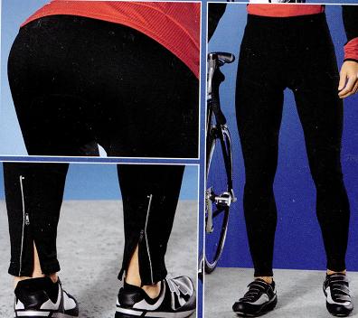 Czarne spodnie rowerowe typu legginsy z suwakami u dołu nogawek, prezentowane na osobie z rowerem w tle.