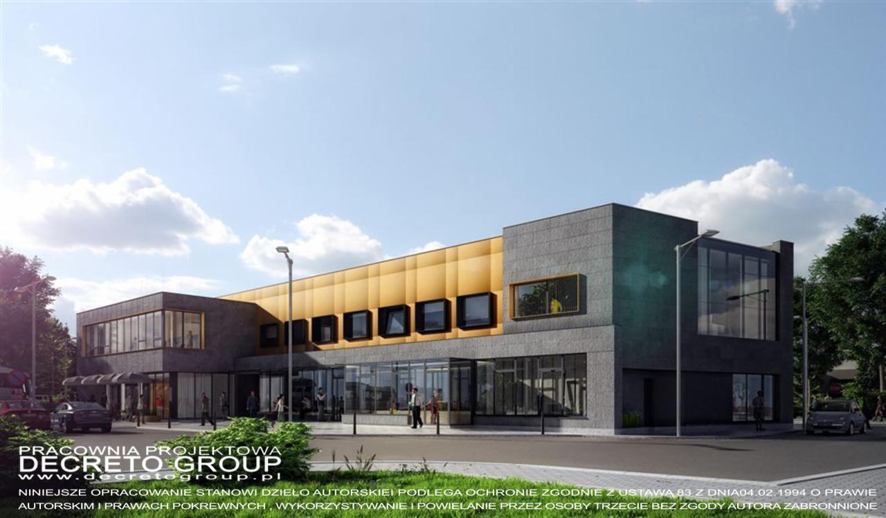 Wizualizacja budynku usługowego z szarą fasadą i złotymi panelami, duże okna, nowoczesny design, otoczenie miejskie, błękitne niebo z chmurami.