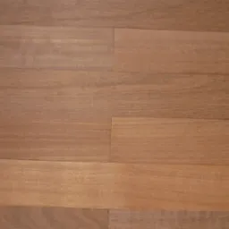 Ułożona deska lita z egzotycznego drewna o ciepłym, brązowym odcieniu, widoczne naturalne usłojenie drewna.