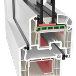 Przekrój poprzeczny białego profilu okiennego PCV, ukazujący wielokomorową budowę i elementy uszczelniające.