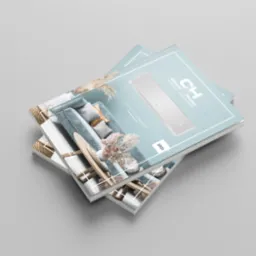 Stos dwóch katalogów produktowych Cooper&Hunter z 2021 roku, prezentujących klimatyzatory i aranżacje wnętrz, na jednolitym szarym tle.